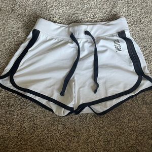 justice white dolphin shorts